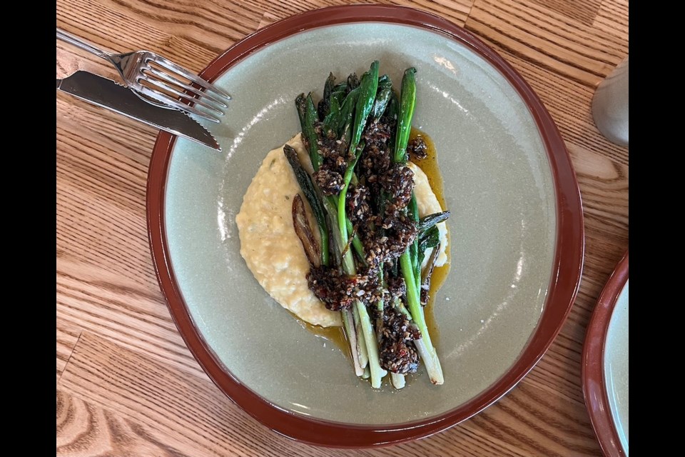 A dish of foraged 'false lily' with mashed beans and a bison XO sauce. The menu at Row Fourteen changes daily, based on what's in season and available.