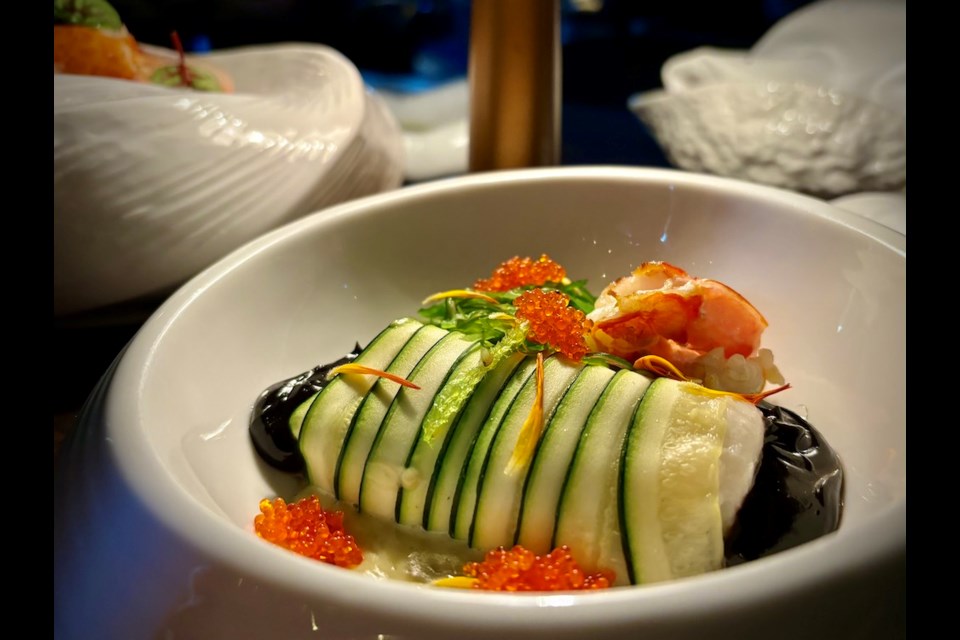 As part od Sidecut's exciting new luxurious tasting menu offering, B.C. Sablefish is rolled in zucchini ribbons and is prepared with razor clams and wild shrimp, seaweed essence, and a squid emulsion.