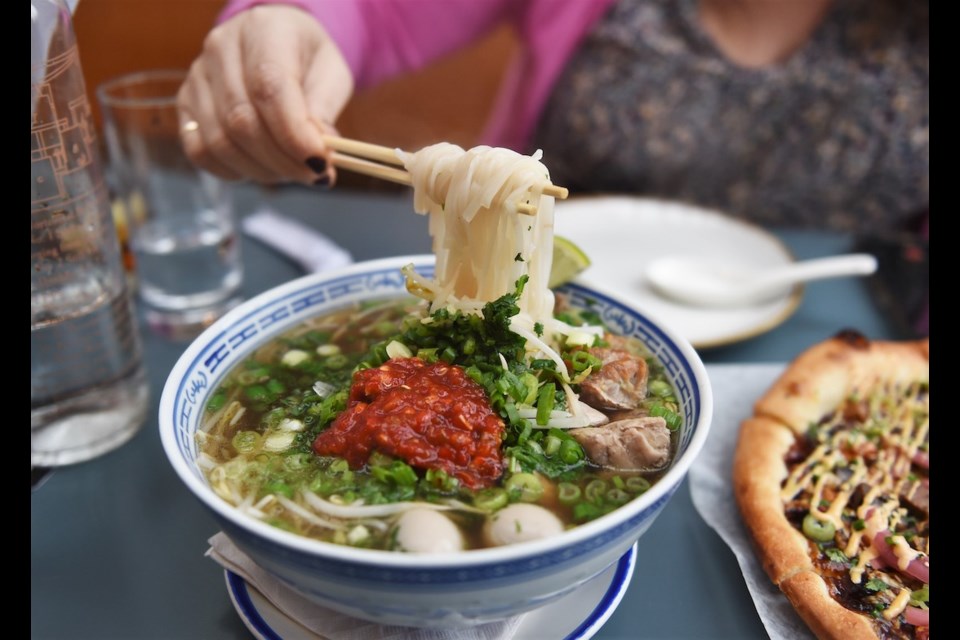 Looking for a lunch deal? During Dine Out Vancouver 2023 there are several restaurants around town offering value-driven lunch menus, including Sing Sing on Main Street, known for comfort eats with a twist like pho and pizza.