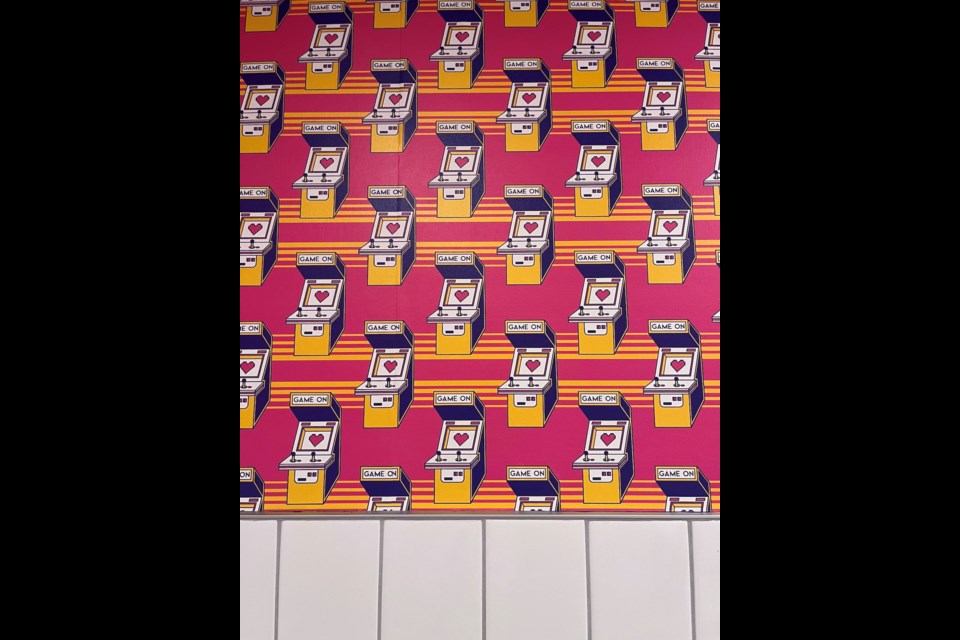 The retro gaming vibes are strong at Street Hawker - even in the washroom!