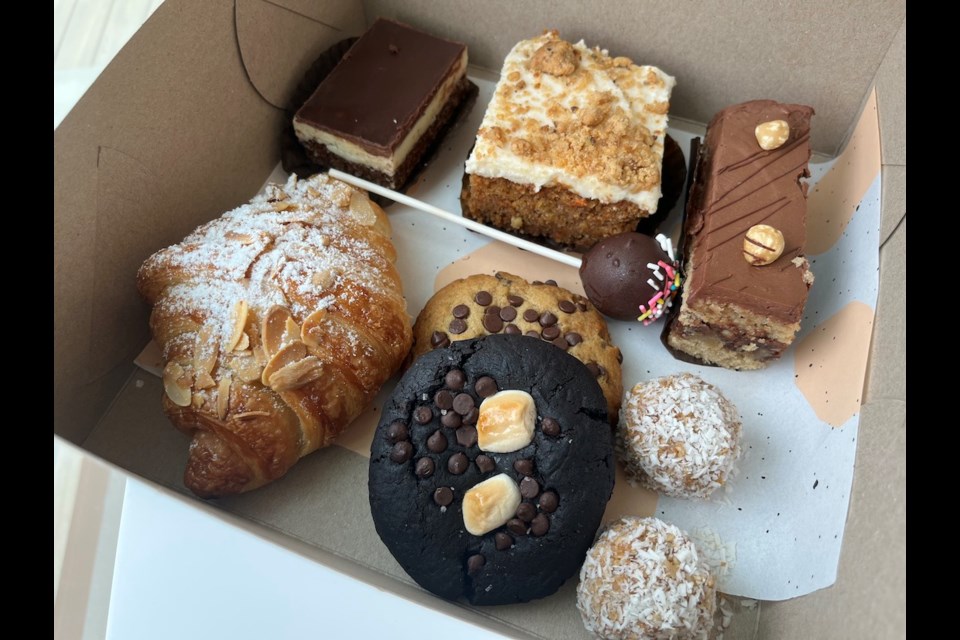 Among the delicious treats available at To Live For are almond croissants, Nanaimo Bars, carrot cake, chocolate hazelnut cake, coconut peanut butter balls, and cookies - and it is all plant-based.