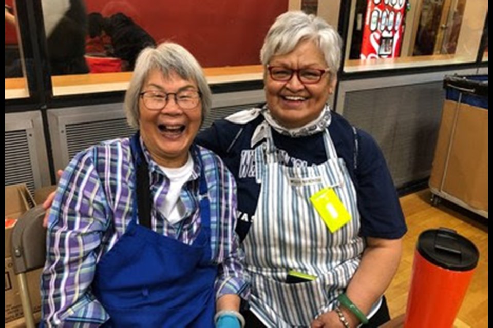 Angelina and Debbie who are best friends and volunteers Photo: CNW Group/The Greater Vancouver Food Bank