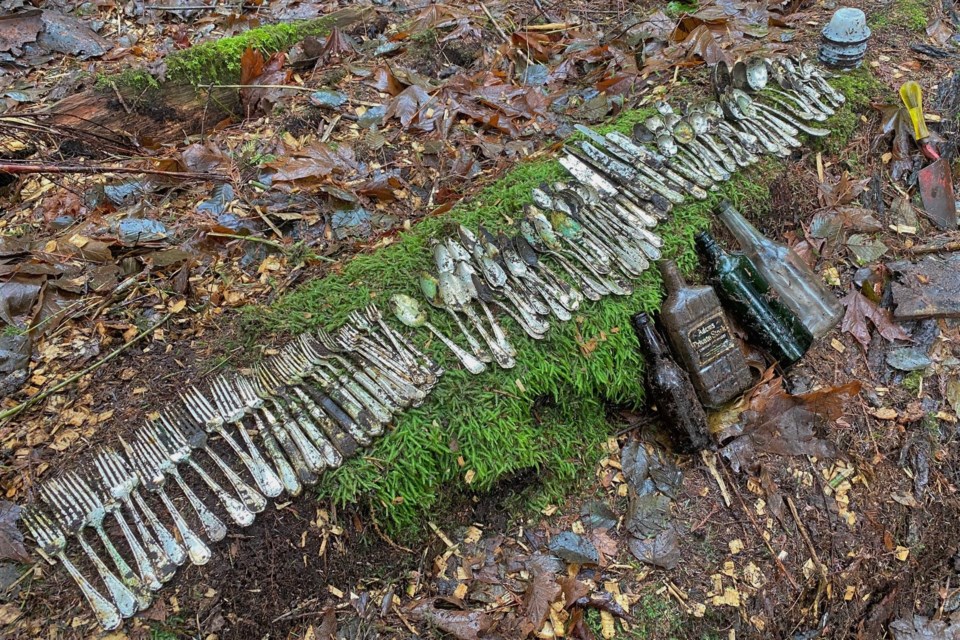 Christian Laub and Julien Hicks went out looking for beer bottles, but found a lost cache of Hotel Vancouver silverware.