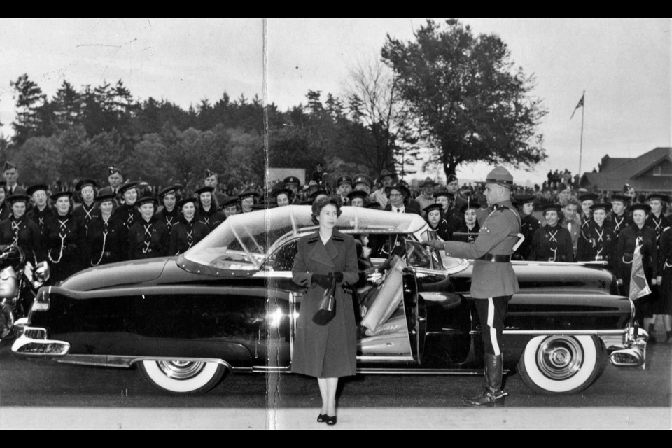 Her Majesty Queen Elizabeth II (at the time she was Her Royal Highness Princess Elizabeth) standing by the royal car on her first official visit to Vancouver in 1951. A troop of Sea Scouts look on.
Reference code: AM1376-: CVA 251-2