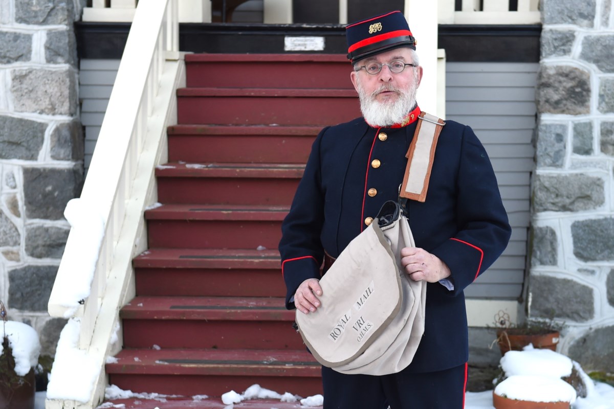 Vancouver letter carrier wears 1895 uniform on route in 2025