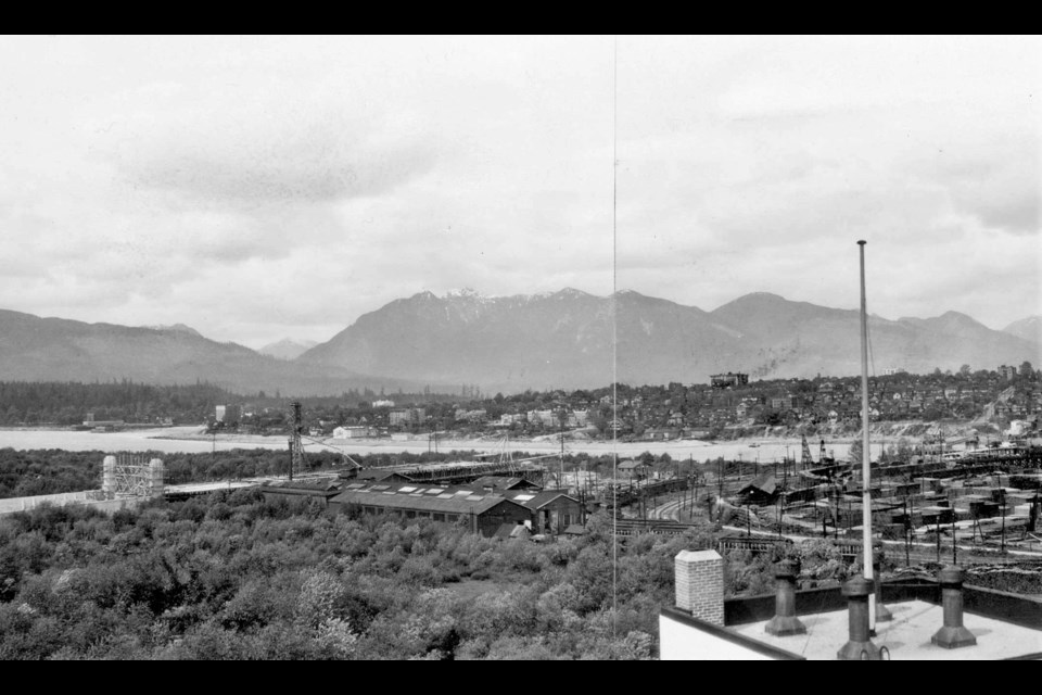 The view from First and Pine of the Burrard Bridge construction. On the far left of the photo the pedestals for the braziers can be seen.
Reference code: AM54-S4-2-: CVA 371-856