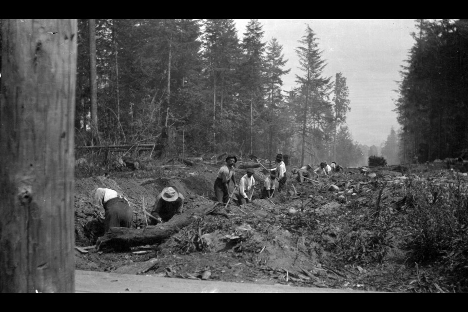 Workers preparing the double track for a streetcar line on 4th Avenue near Waterloo Street in Kitsilano in 1909. Reference: CVA 7-78