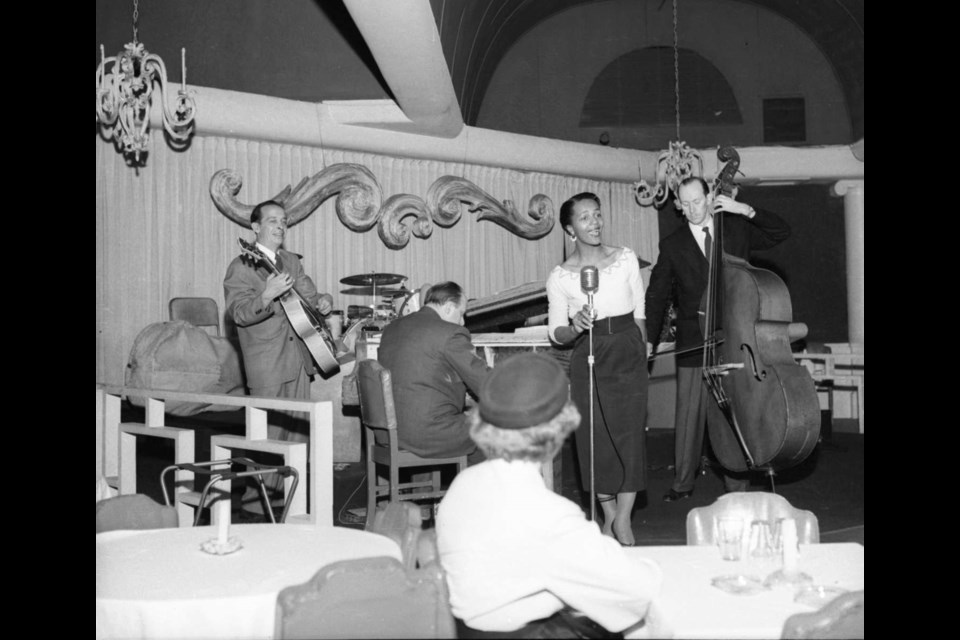 Eleanor Collins singing with a band in the 1940s. Archival item CVA 1184-1220.