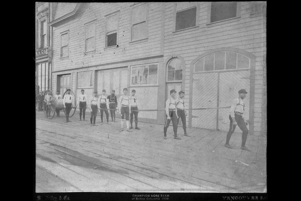 B.C.'s champion hose team in 1889 was from Vancouver. Here they pose in their rig. Reference code: COV-S280-: CVA 354-002