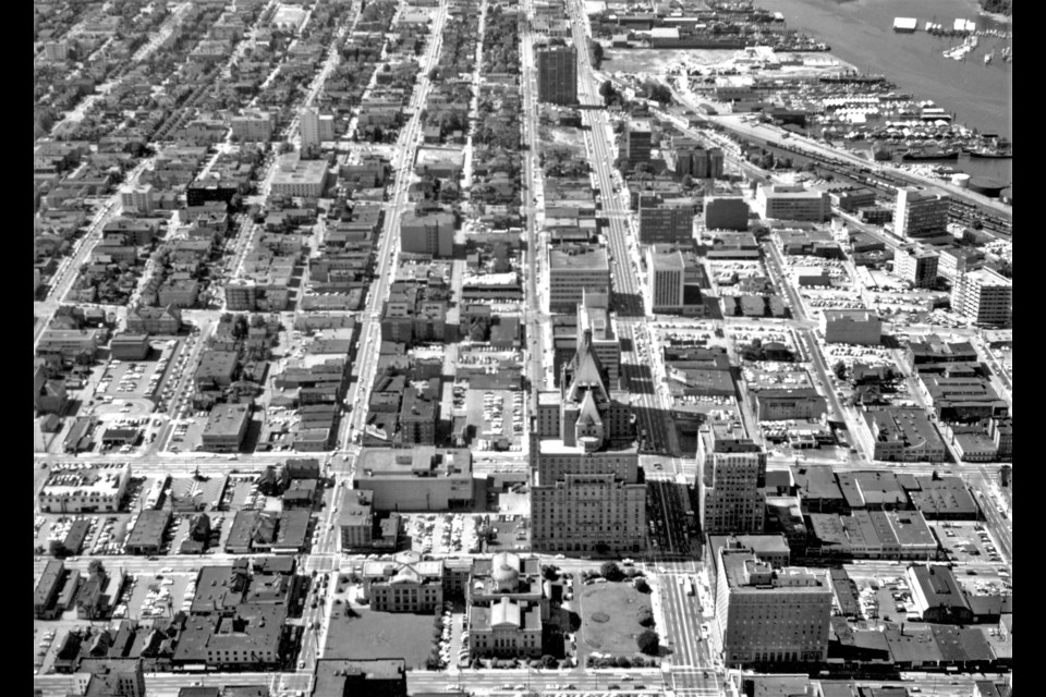 The view west from Granville Street 1960. Hotel Vancouver is the large building in the centre foreground. Reference code: AM54-S4-: Air P93