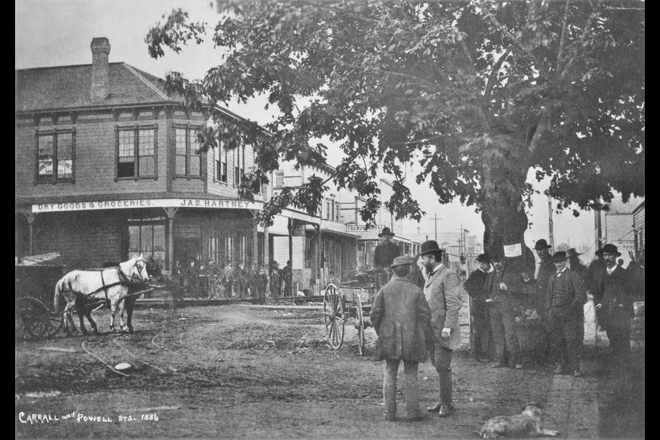 Maple Tree Square days before the Great Fire of 1886 burned much of the city to the ground. The maple tree in the photo is where the square gets its name from.
The square was, until recently, where the statue of Gassy Jack Deighton stood. Reference code: AM753-S1-: CVA 256-06