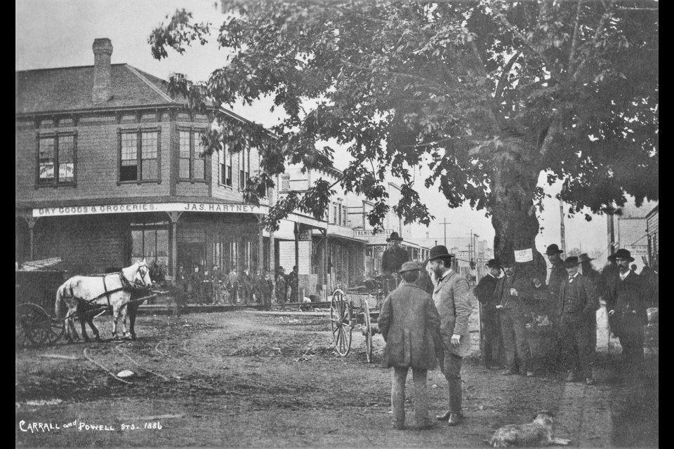 Maple Tree Square days before the Great Fire of 1886 burned much of the city to the ground. The maple tree in the photo is where the square gets its name from.
The square was, until recently, where the statue of Gassy Jack Deighton stood. Reference code: AM753-S1-: CVA 256-06