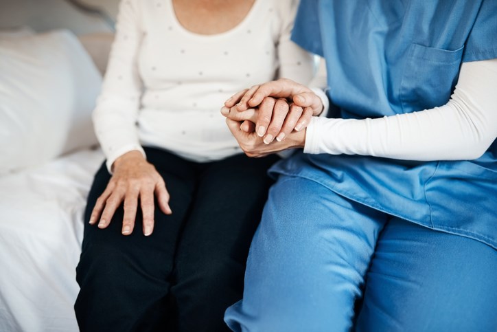 holding-hands-nurse-care-home