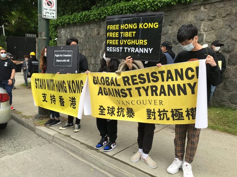 Pro-democracy activists for Hong Kong picketed the Chinese consulate in Vancouver on Granville Street on Saturday May 23, 2020 to voice opposition against a national security law proposed to be implemented unilaterally by Beijing's National People's Congress. There were an estimated 100-200 people along Granville Street. Photo by Ivy Li