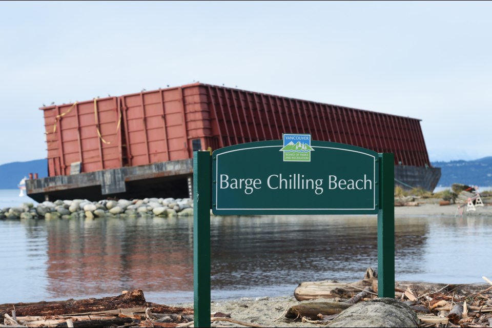 Yes, the Barge Chilling Beach sign is real, and it's spectacular.