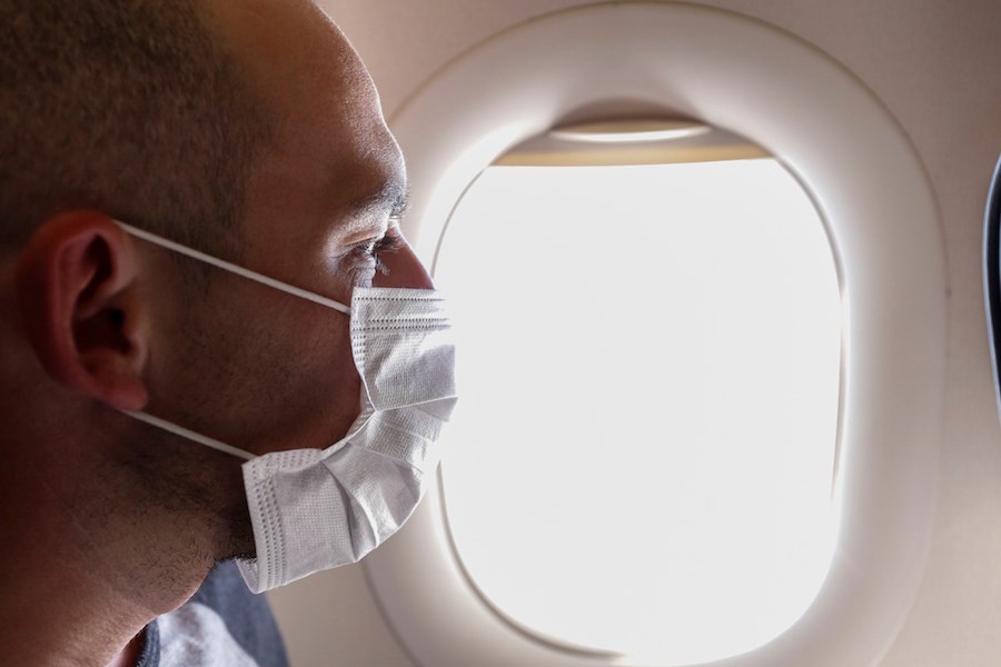 man-face-mask-airplane-flight