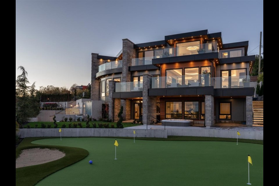 The luxury estate at 815 King Georges Way, among many features, has its very own mini-golf putting green. Photo: REW