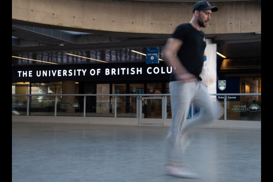 Mitchell Sartori, organizer of YVR Shufflers, dances at the Robson Square ice rink.