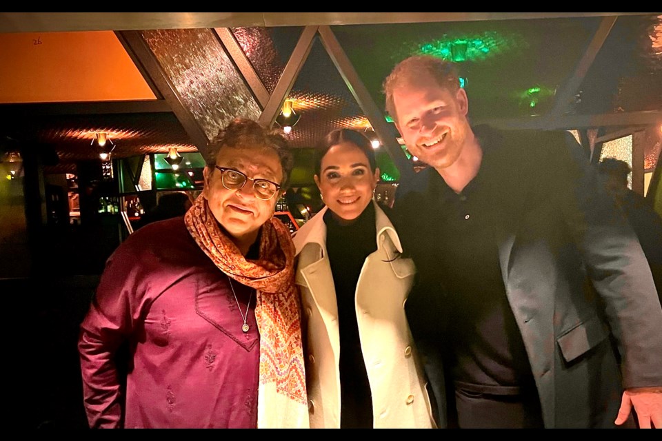 Prince Harry and Meghan Markle, the Duke and Duchess of Sussex, dined at legendary Vancouver restaurant Vij's on Feb. 15, 2024. They posed for a photo with chef/owner Vikram Vij (left). The couple are in Vancouver to prepare for next year's Invictus Games.