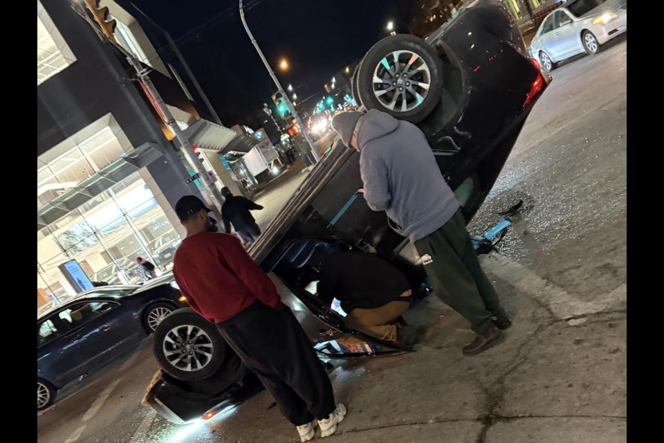 Michel Roman works as a budtender at the ARCannabis Store in Kitsilano in 鶹ýӳand heard a collision that caused an Evo Car Share to flip on its roof.