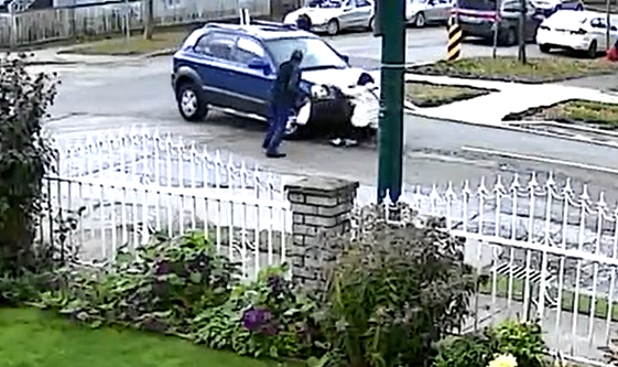Video of the hit and run shows a woman being struck by an SUV as it goes around a corner.