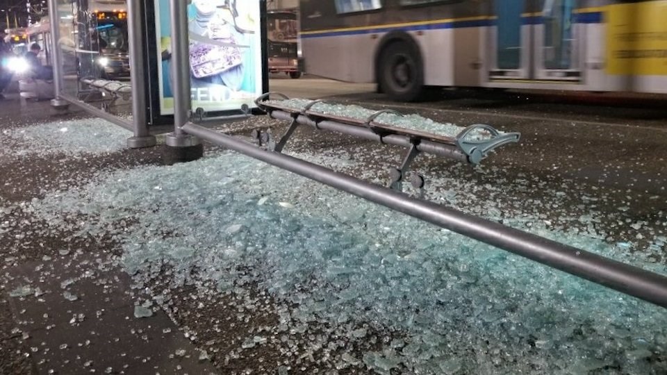 Vancouver police arrested and charged a man with mischief after he allegedly smashed over 20 panes of glass at bus shelters on Granville Street overnight.