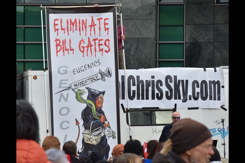 Many of the signs carried anti-Bill Gates messages. He's expected to speak at the TED conference some time this week.