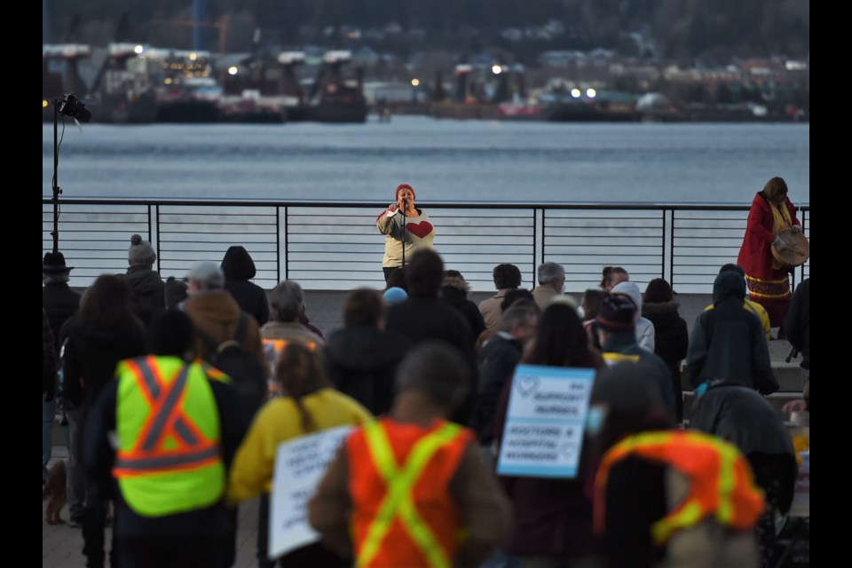 Organizer Michelle Fortin speaks to the crowd at Vancouver's Family Day Gratitude Gathering on Feb. 21, 2022.