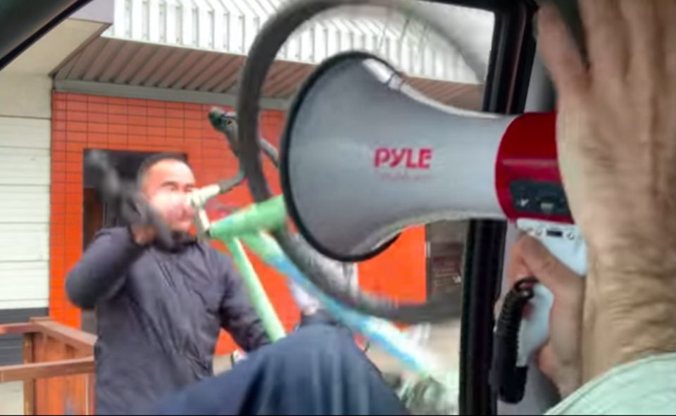 man-shoves-bike-vancouver-anti-masker.jpg