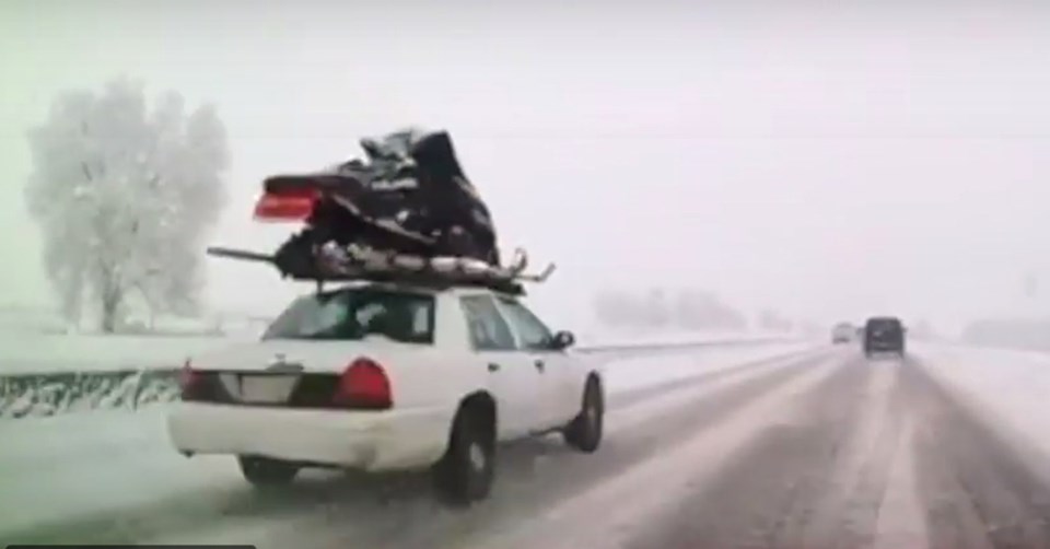 snowmobile on sedan