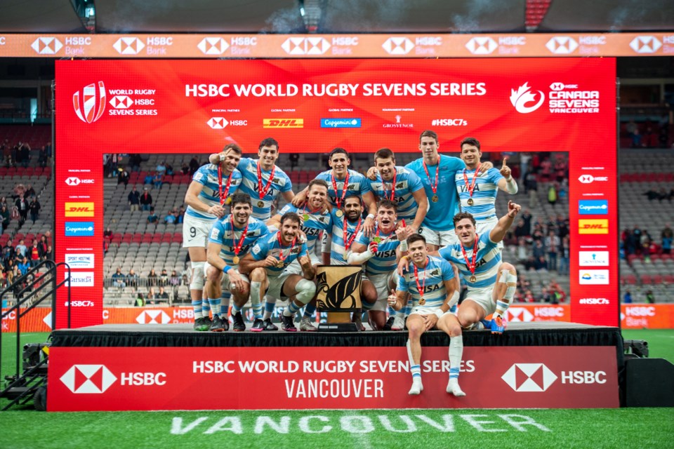 Argentina poses for a team photo with the Canada Sevens trophy after defeating Fiji in Vancouver, B.C., on April 17, 2022. The final score was 29 - 10 