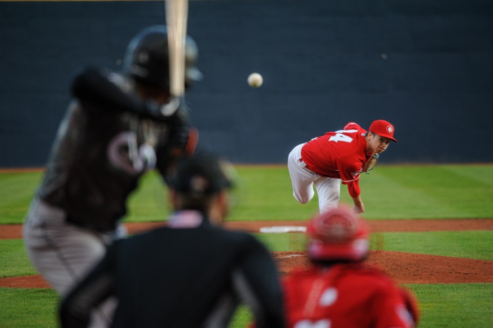 Sem Robberse for the Vancouver Canadians throws a pitch at Nat Bailey Stadium for the home opener against the Eugene Emeralds on April 19, 2022.  The C's were defeated 5-6.