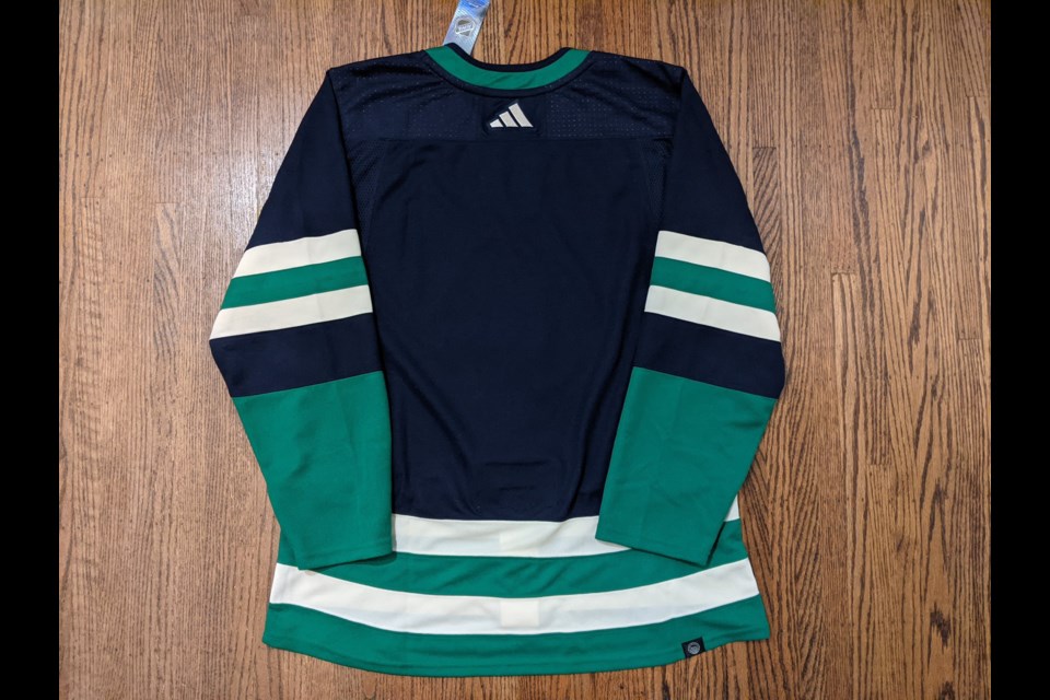 Report: Canucks' new Reverse Retro jersey apparently leaked, featuring 1962  Johnny Canuck logo - CanucksArmy