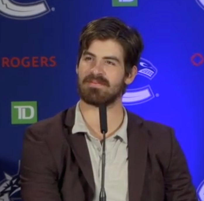 Conor Garland media day hair