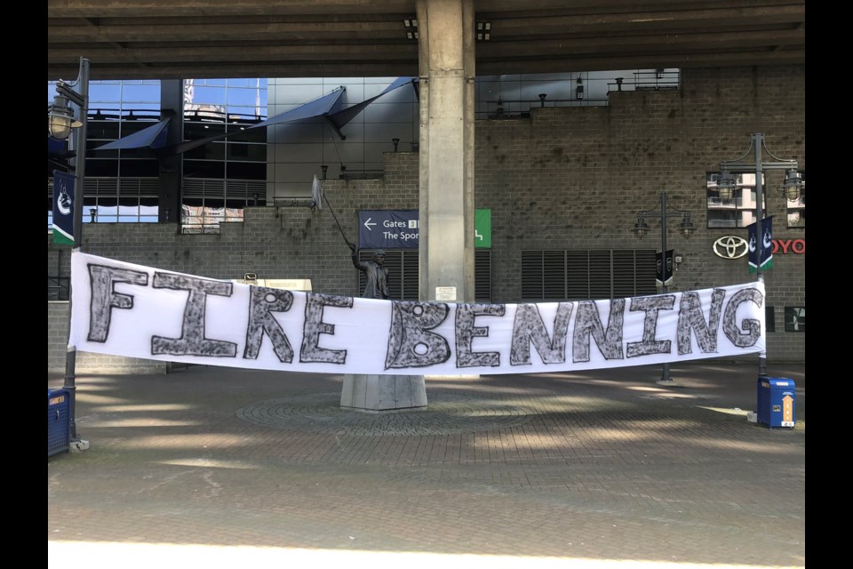 One of the signs displayed outside Rogers Arena to protest the Vancouver Canucks' general manager Jim Benning.