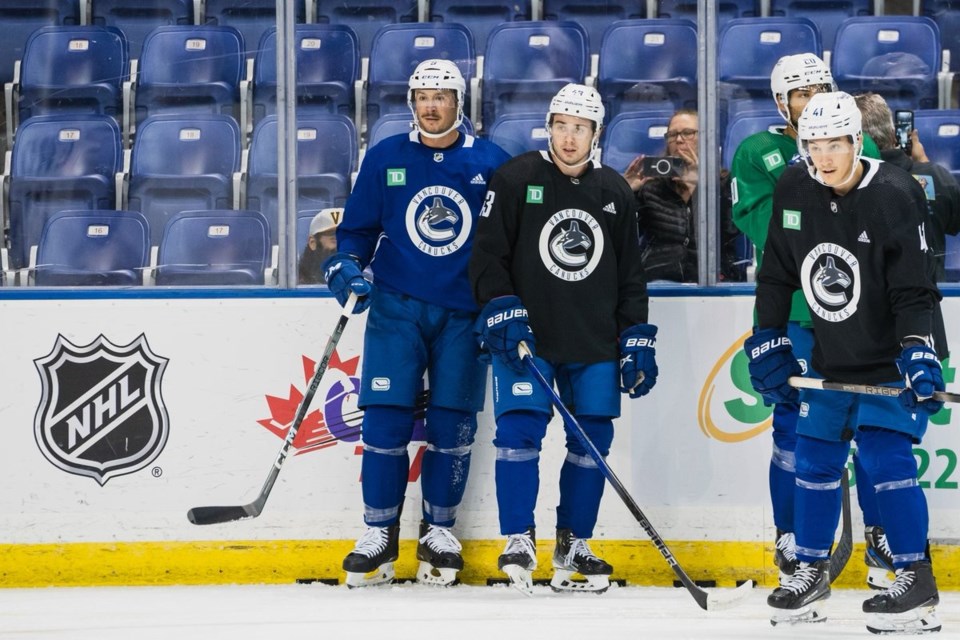 jt-miller-quinn-hughes-akito-hirose-canucks-training-camp-twitter