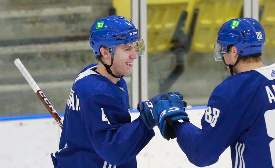 Lekkerimaki and Aman celebrate goal at scrimmage