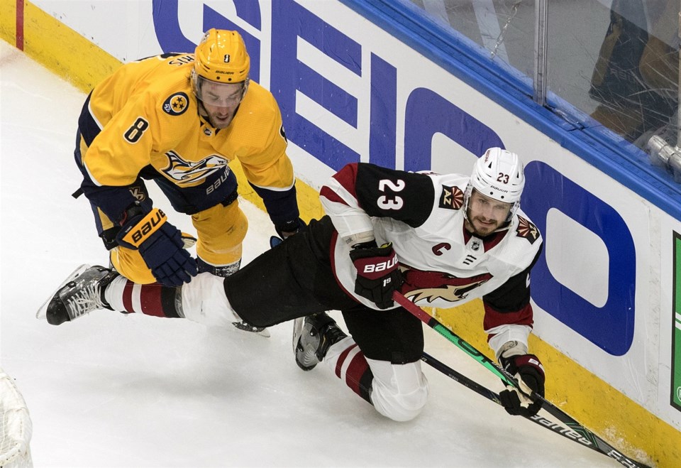 Oliver Ekman-Larsson Vancouver Canucks Unsigned Shooting The Puck vs. Seattle Kraken Photograph