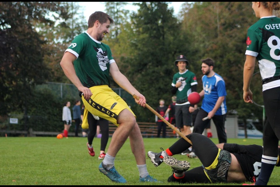 Vancouver quidditch teams the Storm Crows and Vipertooths mid-game.