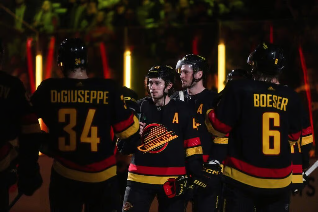 Quinn hughes black skate jersey