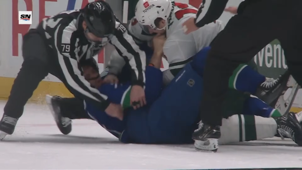 yakov-trenin-punches-derek-forbort-canucks