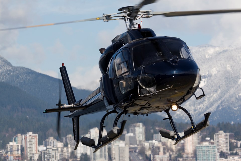 helicopter-over-vancouver-stock-image