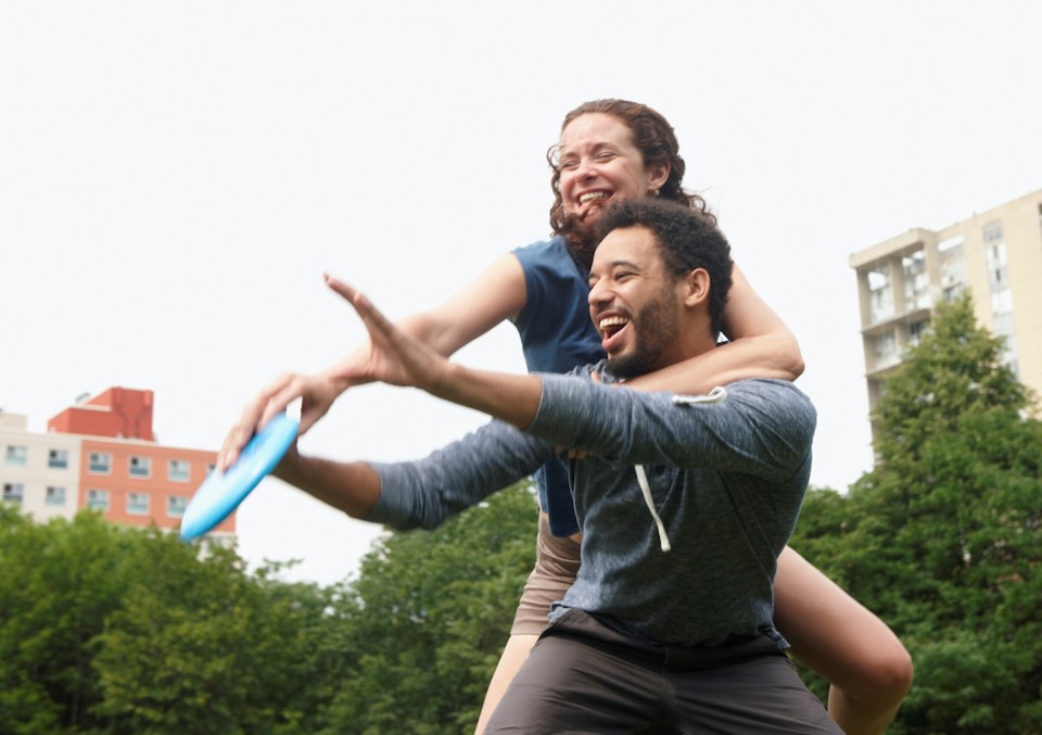 joyful-movement-frisbee-happy-couple-park