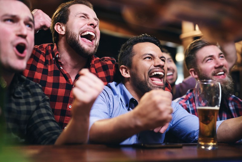 men-watching-sports-bar