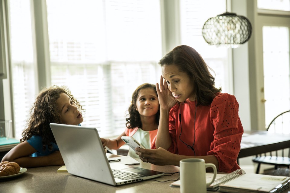 mother-working-home-kids-children