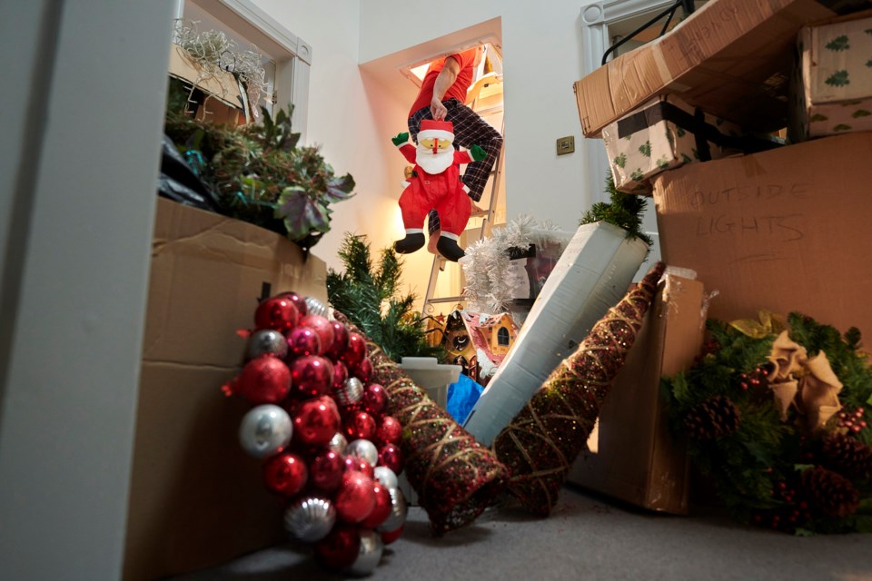 putting-away-christmas-tree-decorations-stock-image