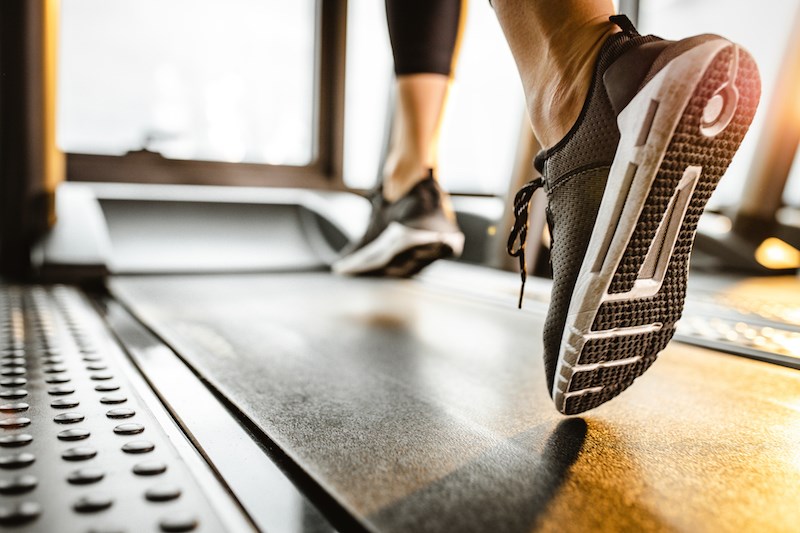 Running on a treadmill.