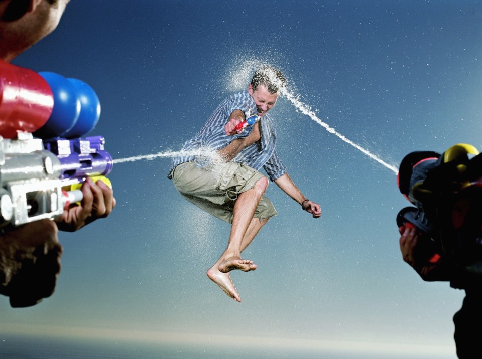 waterfight-adults-stock