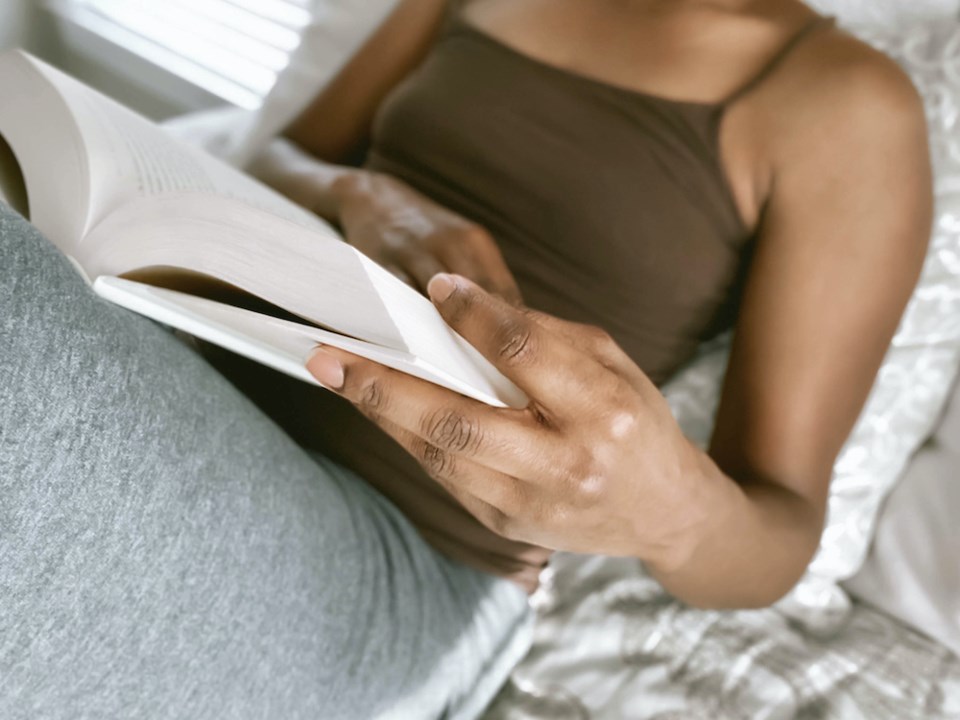 woman-reading-fitness-health-bed