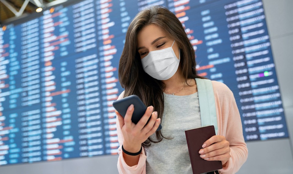 woman-using-arrivecan-app-airport-travel